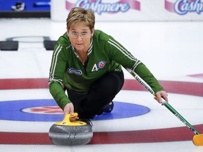 Team Saskatchewan skip Sherry Anderson makes a shot against Team Alberta at the Scotties Tournament of Hearts in Calgary, Alta., Saturday, Feb. 27, 2021. Both Team Sherry Anderson and Team Howard Rajala will play for gold at the world senior curling championships.