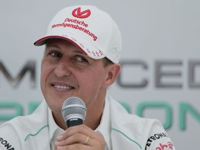 Michael Schumacher announces his retirement from Formula One during a press conference at the Suzuka Circuit venue for the Japanese Formula One Grand Prix in Suzuka, Japan, Oct. 4, 2012.