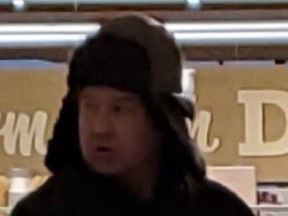 Investigators need help identifying a man who allegedly flashed a gun in a grocery store near Bay and College Sts. on April 1, 2023.