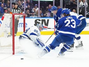 Apr 27, 2023; Toronto, Ontario, CAN; Toronto Maple Leafs left wing Matthew Knies  battles for the puck in front of Tampa Bay Lightning goaltender Andrei Vasilevskiy during the third period in game five of the first round of the 2023 Stanley Cup Playoffs at Scotiabank Arena.