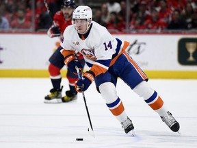New York Islanders center Bo Horvat (14) skates with the puck during the first period of an NHL hockey game against the Washington Capitals, Wednesday, March 29, 2023, in Washington.