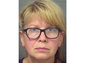 This booking photo provided by the Palm Beach County, Fla., Sheriff's Office shows Sheila Keen-Warren under arrest, Oct. 3, 2017.