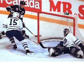 May 29, 1993. LA Kings captain Wayne Gretzky scores against Toronto Maple Leafs goalie Felix Potvin as defenceman Dmitri Mironov gets there too late. It was Gretzky's his third goal in game seven of the Campbell Conference Finals at the Maple Leaf Gardens in Toronto on May 29, 1993.