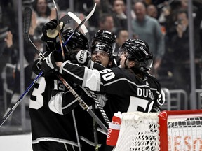 The Kings celebrates there overtime win over the Oilers on Friday night.