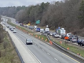In a still frame from video provided by WGME-TV traffic is backed up near a scene where people were injured in a shooting on Interstate 295, in Yarmouth, Maine, Tuesday, April 18, 2023.