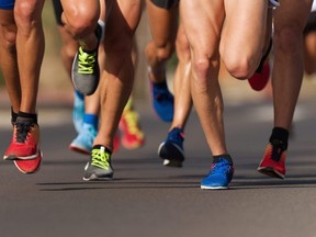 People run during a marathon race.