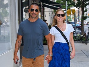 Mark Consuelos and Kelly Ripa are pictured in New York City  on July 21, 2022.