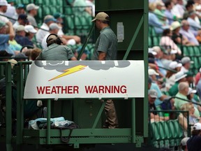 Weather warning signage sits ready for display during the Masters at Augusta National Golf Club on April 6, 2023 in Augusta, Georgia.