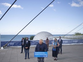 Ontario Premier Doug Ford stands at the podium as he makes an announcement at Toronto's Ontario Place, on Friday July 30, 2021.