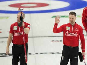 Team Canada, (L-R) 3rd. Mark Nichols, skip Brad Gushue, during draw 18 against team Turkey.Canada defeats Turkey 9-5.