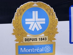The Montreal Police logo is seen on a police car in Montreal on July 8, 2020.