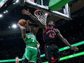 Toronto Raptors forward Pascal Siakam (43) defends against Boston Celtics guard Jaylen Brown (7) in the second half at TD Garden.