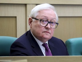 In this handout photo released by The Federal Assembly of The Russian Federation, Russian Deputy Foreign Minister Sergei Ryabkov attends a session of the Federal Assembly in Moscow, Russia, Wednesday, April 12, 2023.