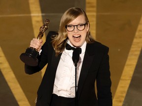 Sarah Polley accepts the Best Adapted Screenplay award at 95th Oscars.