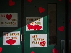 Messages of support for teacher Abby Zwerner, who was shot by a 6-year-old student, grace the front door of Richneck Elementary School Newport News, Va. on Jan. 9, 2023.