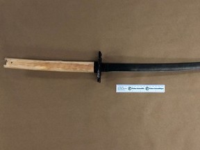 A weapon recovered by Strathcona County RCMP at a house on Pine Street in Sherwood Park on Monday, Sept. 23, 2019, after an officer-involved shooting. A 42-year-old woman was apparently armed with a katana, a Japanese sword characterized by a curved, single-edged blade.