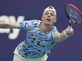 Denis Shapovalov of Canada reaches for a serve by Taylor Fritz during the Miami Open tennis tournament, Sunday, March 26, 2023, in Miami Gardens, Fla. Shapovalov has been bounced from the Barcelona Open. He lost in straight sets to Greece's Stefanos Tsitsipas in the clay court tournament's Round of 16.THE CANADIAN PRESS-AP/Marta Lavandier