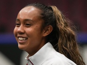 Canada's Leylah Annie Fernandez smiles after a practice session for the Billie Jean King Cup tennis qualifiers against Belgium, in Vancouver, B.C., Tuesday, April 11, 2023.