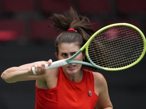 Canada's Rebecca Marino watches her shot after returning to Belgium's Ysaline Bonaventure during a Billie Jean King Cup qualifiers singles match, in Vancouver, on Friday, April 14, 2023.