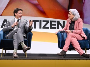 Prime Minister Justin Trudeau and Lisa LaFlamme speak at the Global Citizen NOW Summit at The Glasshouse on April 27, 2023 in New York City.