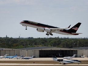 Former U.S. President Donald Trump's private airplane, also known as Trump Force One, takes off from the Palm Beach International Airport on April 3, 2023 in West Palm Beach, Florida.
