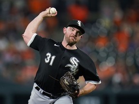 Chicago White Sox relief pitcher Liam Hendriks throws to a Baltimore Orioles batter during the ninth inning of a baseball game Aug. 25, 2022, in Baltimore.