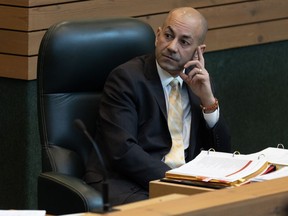 Yukon Premier Ranj Pillai listens to a speaker during question period at the Yukon legislative assembly in Whitehorse on Wednesday, March 22, 2023.