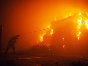 A building burns in Kyiv.
