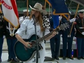 Jewel sings the U.S. National Anthem at the Indy 500.