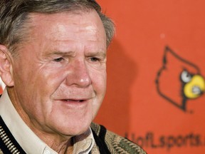 Former Louisville NCAA college basketball coach Denny Crum speaks during a news conference.
