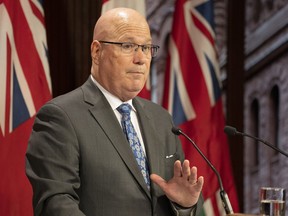 Steve Clark, Secretary of State for Communities and Housing, speaks to journalists