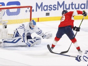 Joseph Woll of the Toronto Maple Leafs stops a shot by Matthew Tkachuk of the Florida Panthers during Game 3.