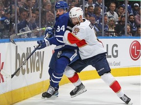 Sam Bennett of the Florida Panthers rides Auston Matthews of the Toronto Maple Leafs off the puck during Game Two of the Second Round of the 2023 Stanley Cup Playoffs at Scotiabank Arena on May 4, 2023 in Toronto, Ontario, Canada.