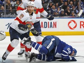 Sam Bennett of the Florida Panthers takes a cross checking penalty against Michael Bunting of the Toronto Maple Leafs during Game Two of the Second Round of the 2023 Stanley Cup Playoffs at Scotiabank Arena on May 4, 2023 in Toronto, Ontario, Canada.