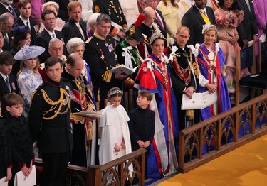 Front row third left to right: Prince William, Prince of Wales, Princess Charlotte, Prince Louis, Catherine, Princess of Wales, Prince Edward, the Duke of Edinburgh and Sophie, the Duchess of Edinburgh with Prince Harry, Duke of Sussex (third row fourth right) at the coronation ceremony of King Charles III and Queen Camilla in Westminster Abbey on May 6, 2023 in London.