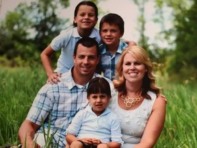 Sgt. Sylvain Routhier, Sarah Routhier, and their three children.