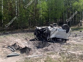 This handout picture released by the Russian Investigative Committee on May 6, 2023 shows the place of explosion of a car of Russian writer Zakhar Prilepin in Nizhny Novgorod region.