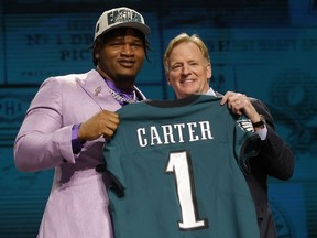 Jalen Carter poses with NFL Commissioner Roger Goodell after being selected ninth overall by the Philadelphia Eagles during the first round of the 2023 NFL Draft at Union Station on April 27, 2023 in Kansas City, Missouri.