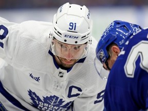 John Tavares of the Toronto Maple Leafs faces off in the first period during Game Six of the First Round of the 2023 Stanley Cup Playoffs against the Tampa Bay Lightning at Amalie Arena on April 29, 2023 in Tampa, Florida.