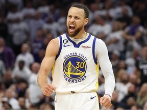 Stephen Curry of the Golden State Warriors celebrates during the third quarter in game seven of the Western Conference First Round Playoffs against the Sacramento Kings at Golden 1 Center on April 30, 2023 in Sacramento, California.