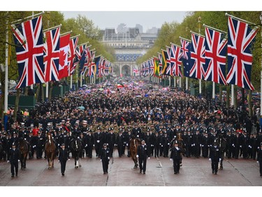 The military procession, the largest of its kind since the 1953 Coronation of Her Majesty Queen Elizabeth II makes its way down The Mall towards Buckingham Palace during the Coronation of King Charles III and Queen Camilla on May 6, 2023 in London.