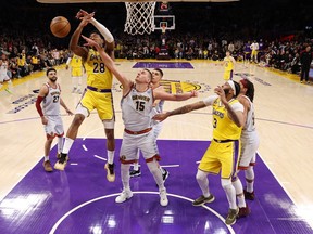 Nikola Jokic #15 of the Denver Nuggets blocks the shot attempt of Rui Hachimura #28 of the Los Angeles Lakers during the third quarter in game four of the Western Conference Finals at Crypto.com Arena on May 22, 2023 in Los Angeles.