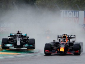 Red Bull's Max Verstappen and Mercedes' Lewis Hamilton in action during the race at Imola in 2021.