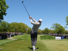 Scottie Scheffler plays his shot from the seventh tee during a practice round prior to the PGA Championship.