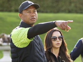 US golfer Tiger Woods and his then-girlfriend Erica Herman.