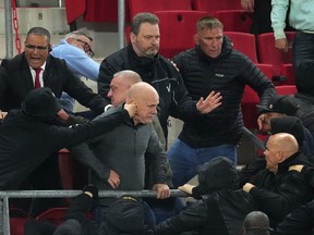 Riots break out between supporters in the stands after the UEFA Conference League semi-final match between AZ Alkmaar and West Ham United FC.