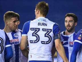 Wigan Athletic will be deducted four points next season for failing to pay its players.