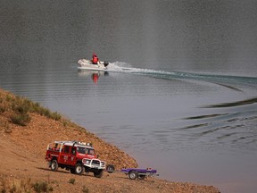 Portuguese authorities from the Judicial Police (PJ) criminal investigation unit work during new search operation amid the investigation into the disappearance of Madeleine McCann (Maddie) in the Arade dam area, in Silves, Portugal, on May23, 2023.