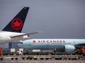 Air Canada planes are parked at Toronto Pearson Airport