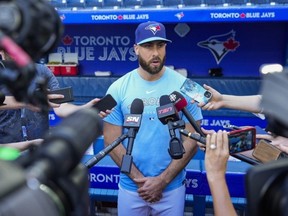 Blue Jays pitcher Anthony Basstalks to reporters at Rogers Centre on Tuesday.